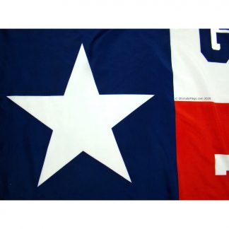 closeup on god bless texas flag