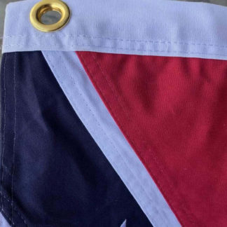closeup of cotton confederate flag sewing and brass grommets