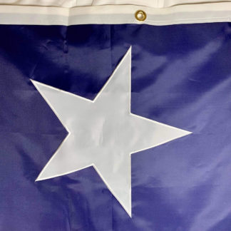 texas star flag closeup of sewing on the star