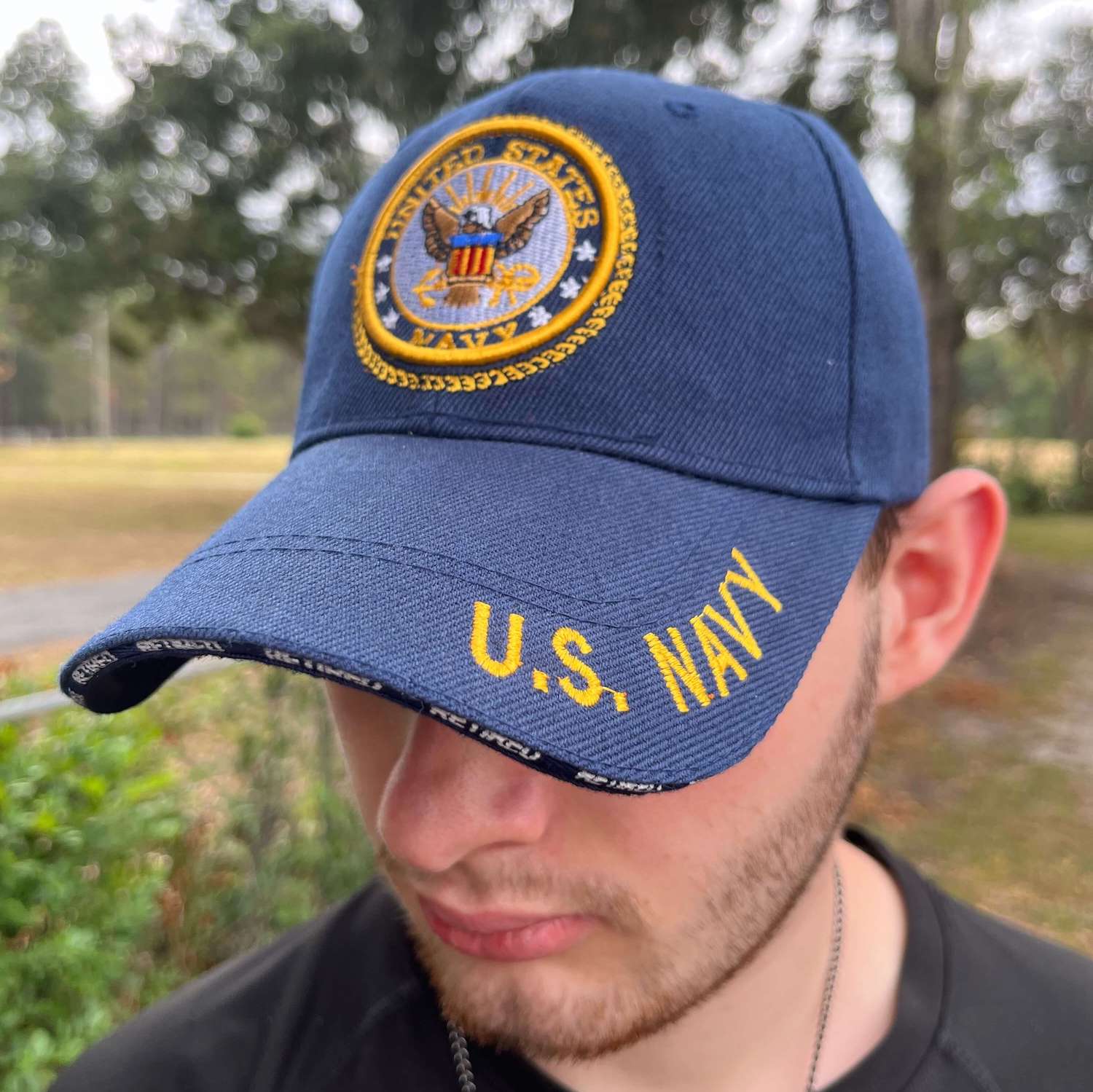U.S. Navy embroidered on Brim / Bill Navy emblem / seal embroidered on front